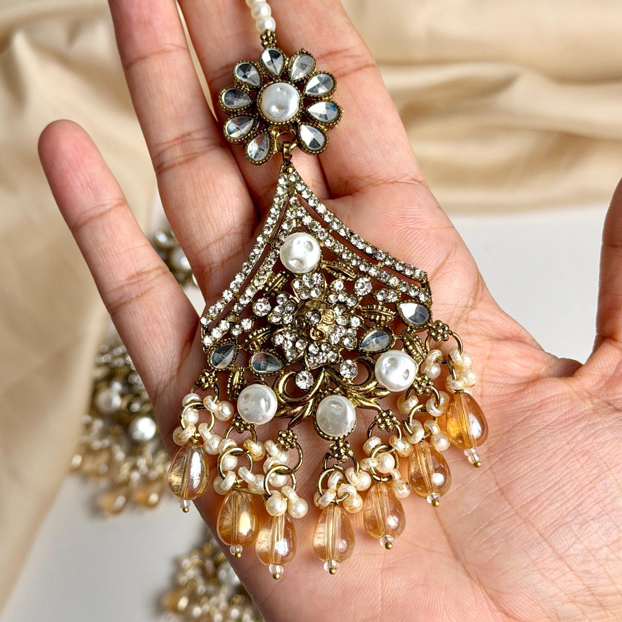 Arshia earrings and teeka set (Champagne)
